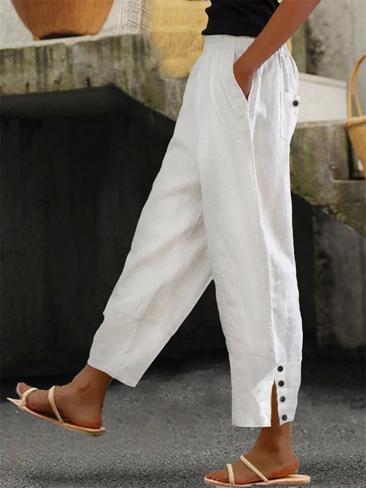 Loose fit buttoned minimalist trousers for women | Solene